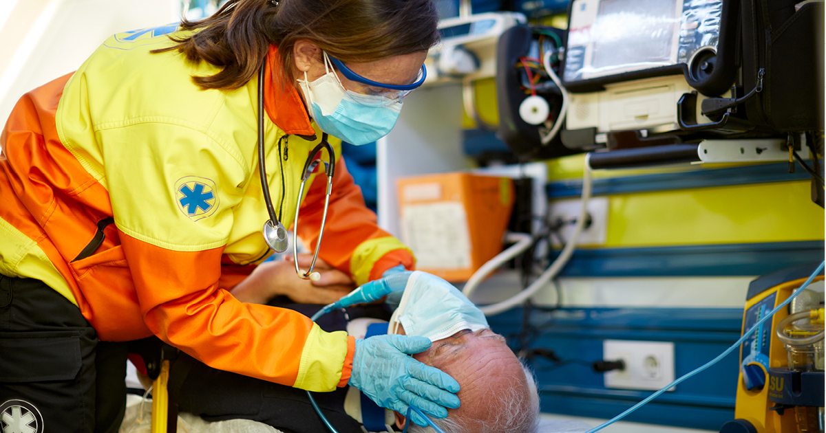 paramedic_treating_patient_respiratory_event paramedic_treating_patient_respiratory_event